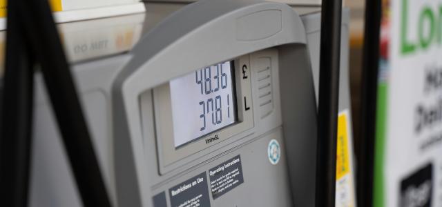 a close up of a gas pump at a gas station by Krzysztof Hepner courtesy of Unsplash.